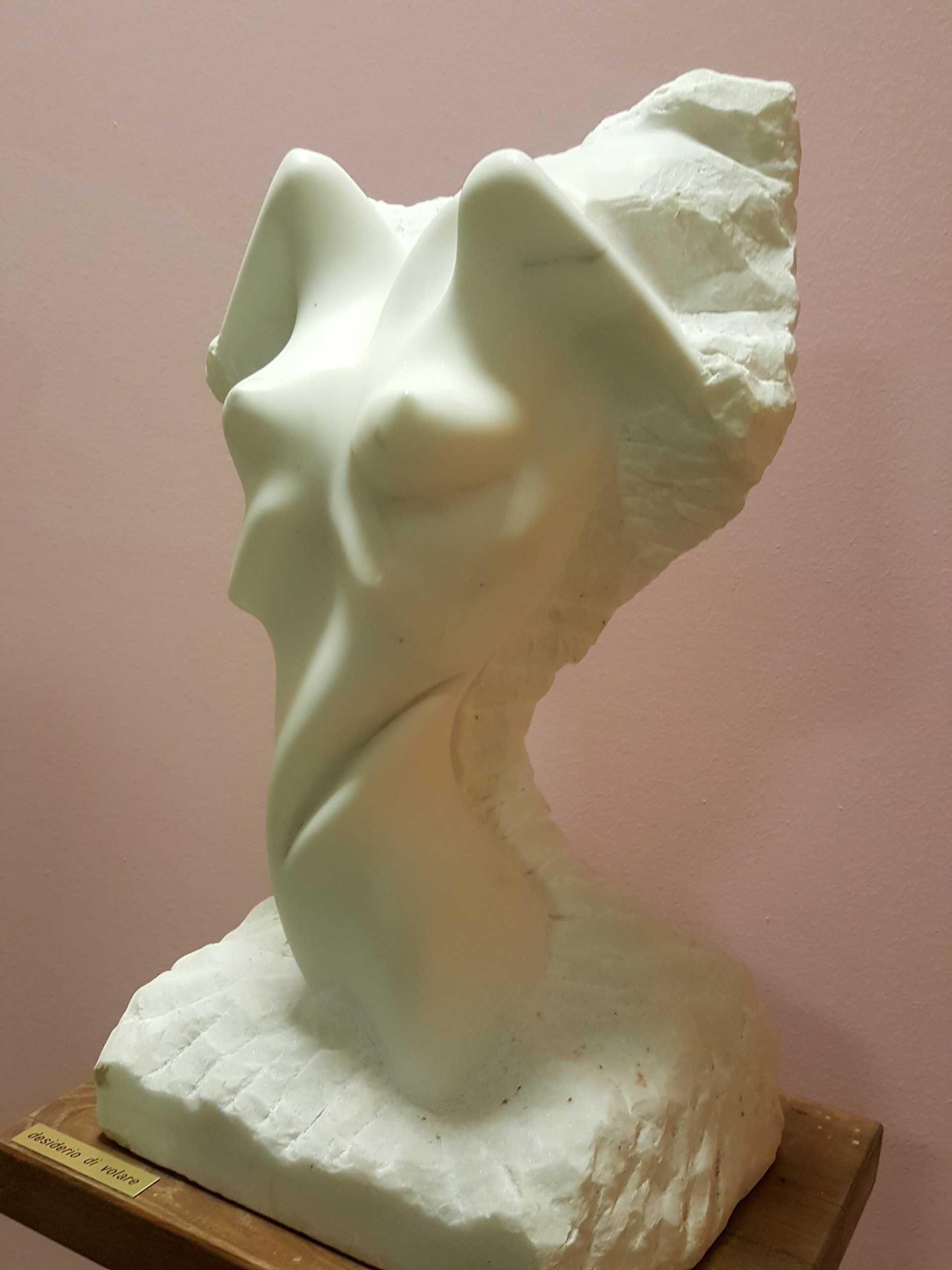 Scultura marmo Mario da Corgeno mostra arte Bodio Lomnago